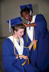 graduation cap and gowns